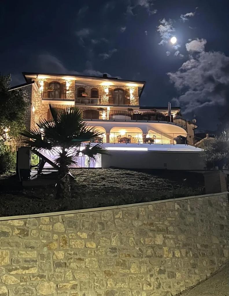 BBB property illuminated at night under the moon